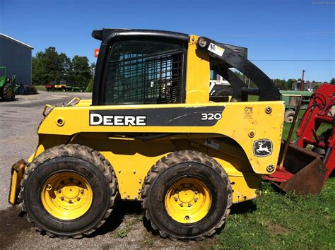 jd 320 skid steer tractor data|john deere 320 value.